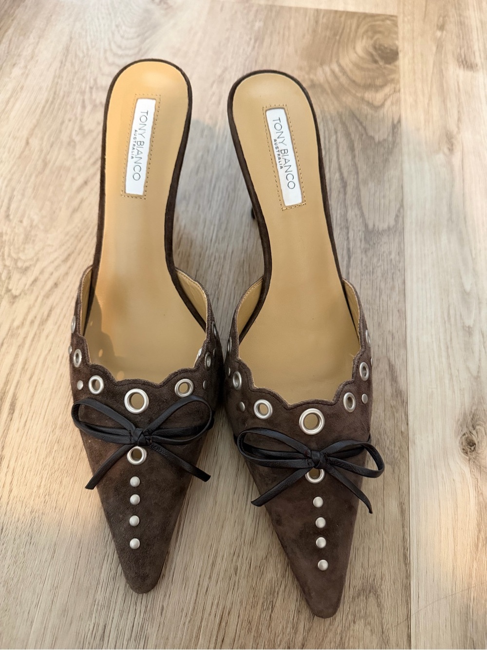 Tony Bianco Brown Suede Pointed Toe Mules with Bow & Grommets